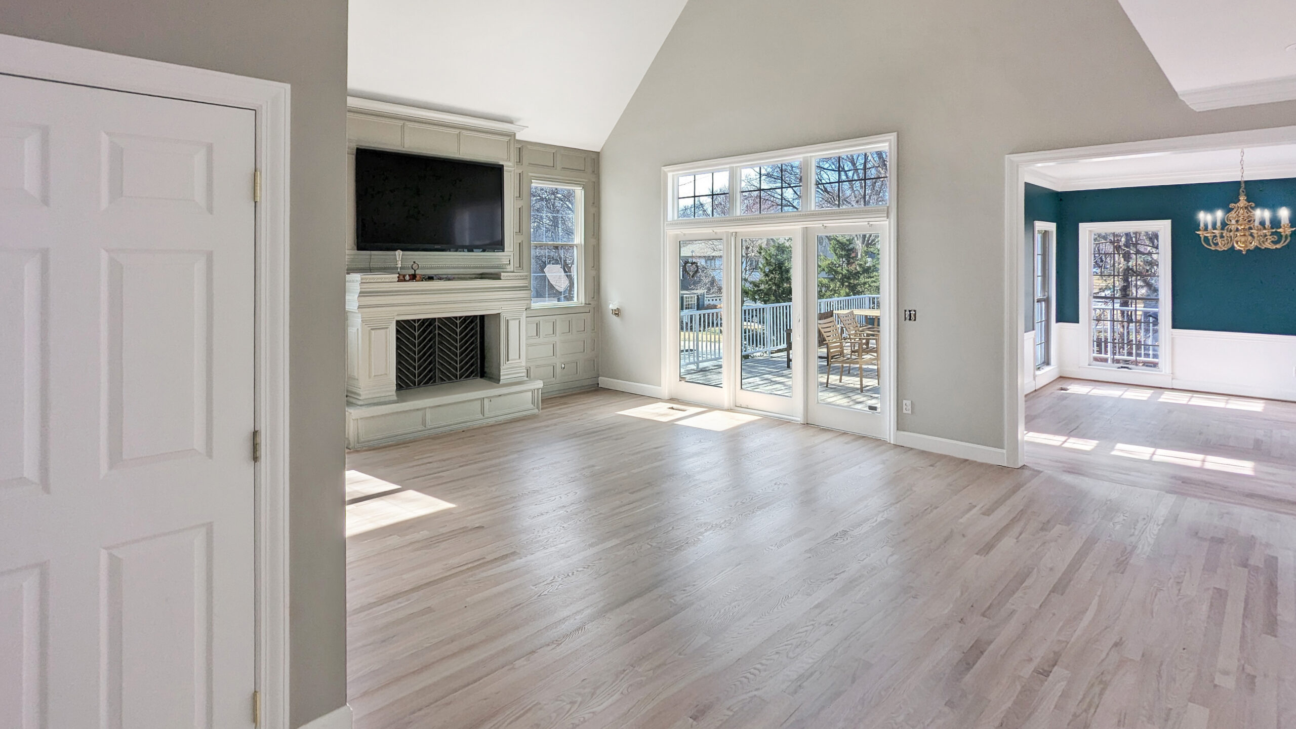 Seamless hardwood floor transition between rooms