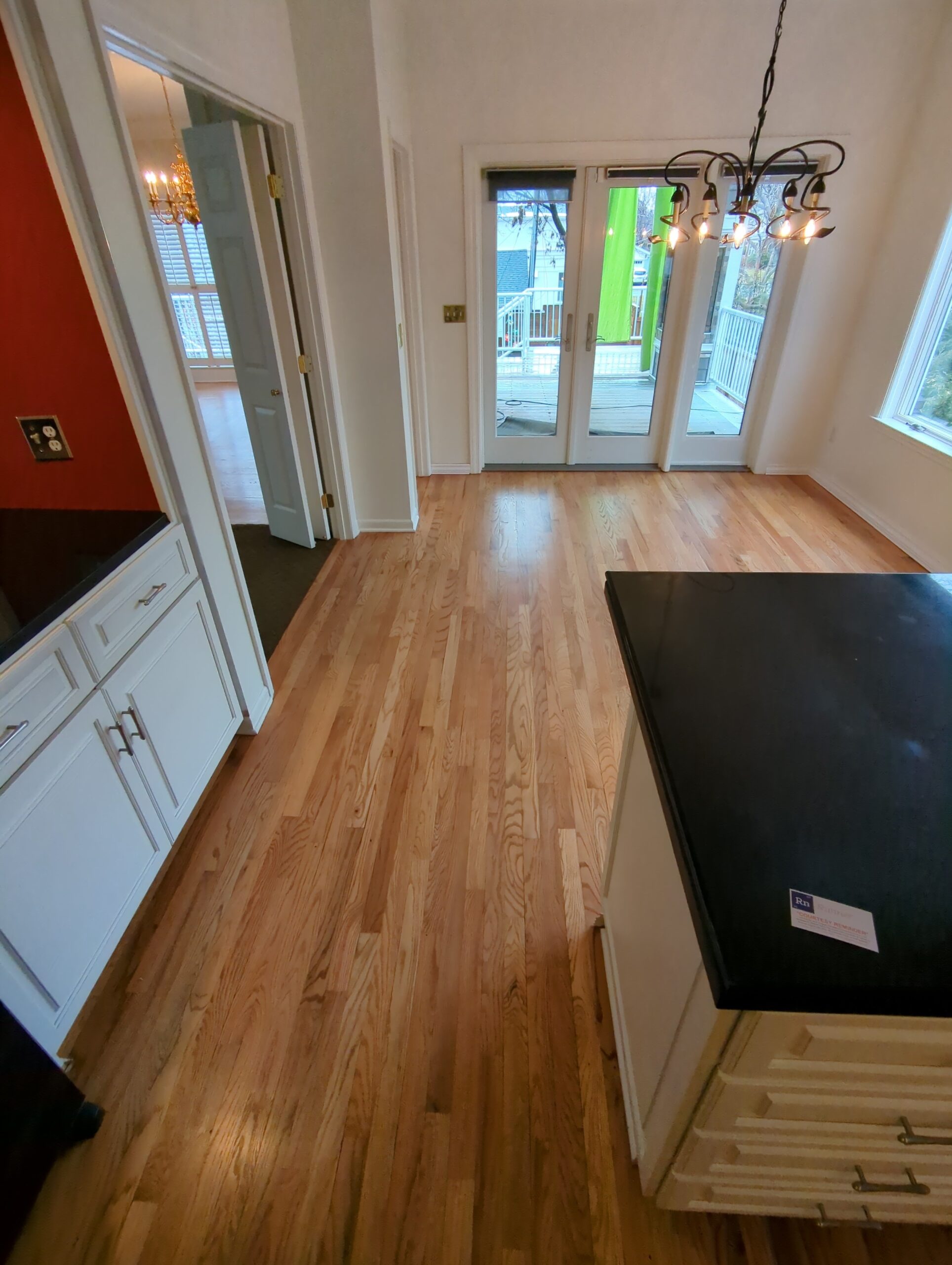 Kitchen hardwood floor before refinishing