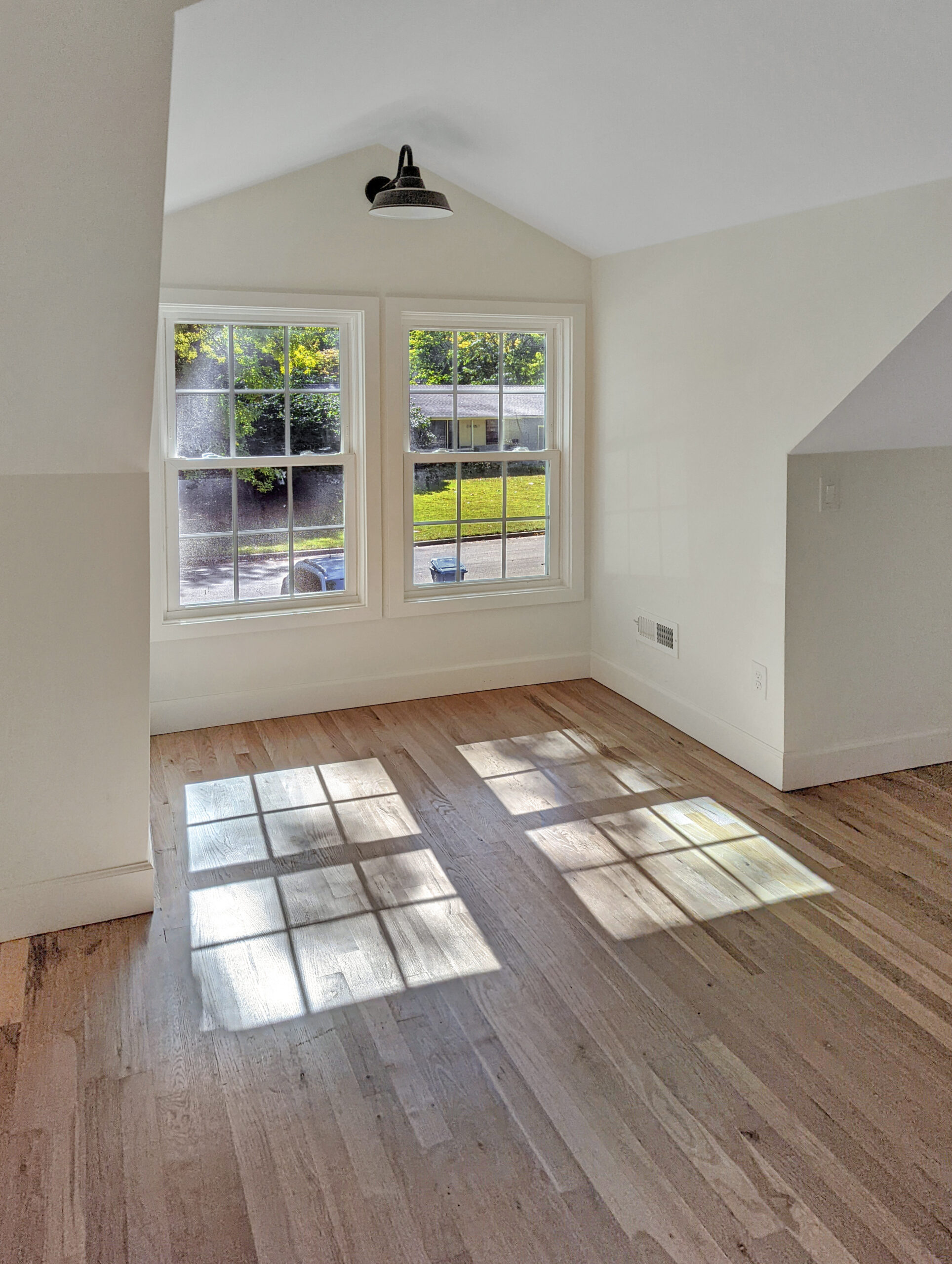 Natural white oak hardwood flooring installation upstairs in Prairie Village home